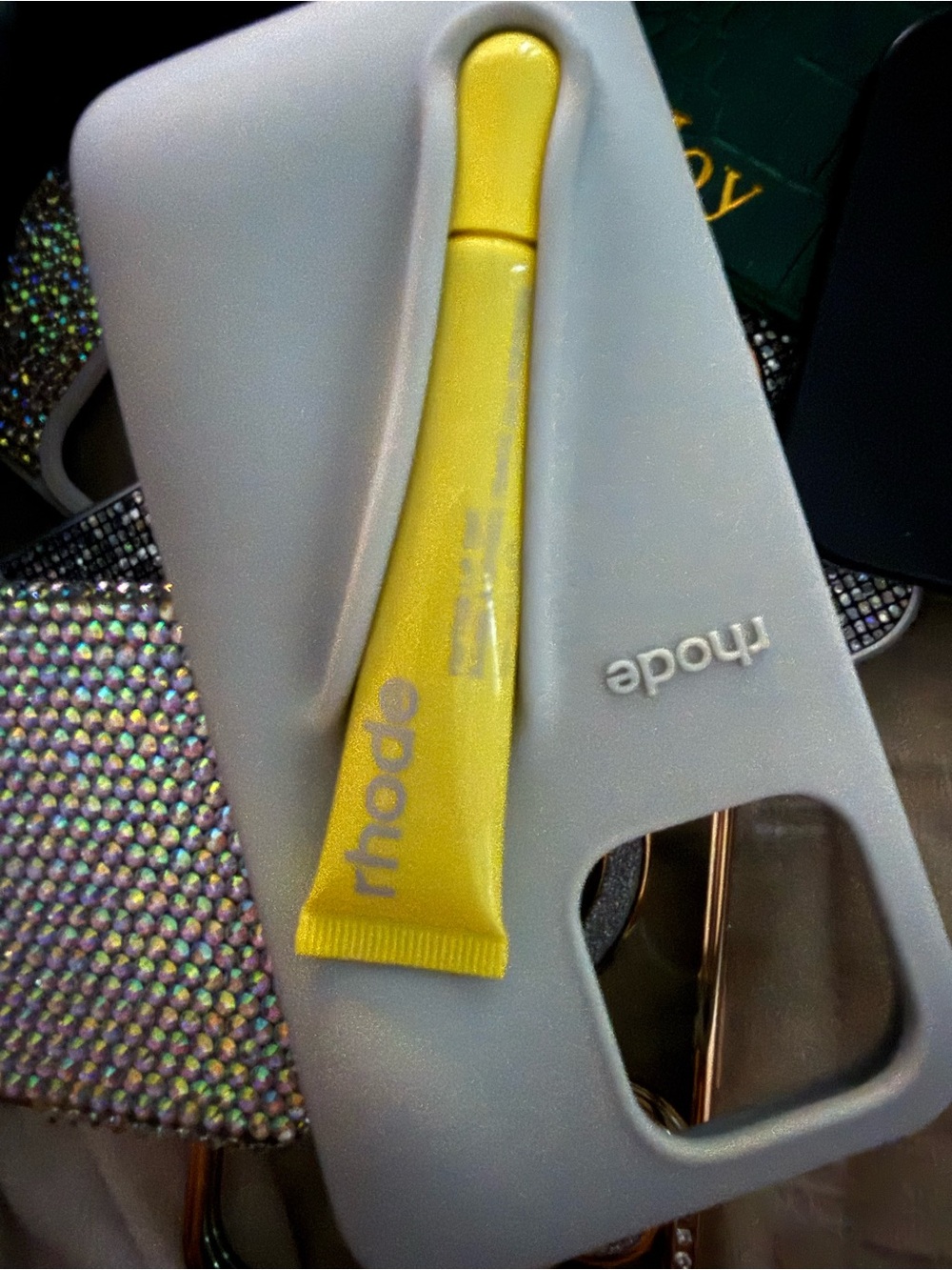 RHODE Yellow Lip Gloss Tube with Light Gray Silicone Phone Case